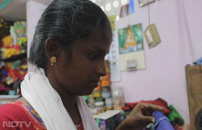 Josephine, a mother of three children also works at Matilda's Silai school. Her husband is a farm labourer and she supplements her family with her monthly income of Rs. 7000. As a girl she faced discrimination at home but today she is financially independent. Now empowered economically, she wants to give her two daughters and son the best opportunities.