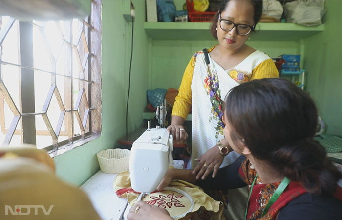 Leda joined a sewing class in Shillong but could not start her unit as she had no sewing machine. That is when she heard about the initiative of the Swavalamban Silai School, and decided to do the training. Post training, Leda repurposed her mother's old tea stall into a brand new Silai school of her own, with the use of the machines given by USHA International. Since then there has been no looking back for Leda.