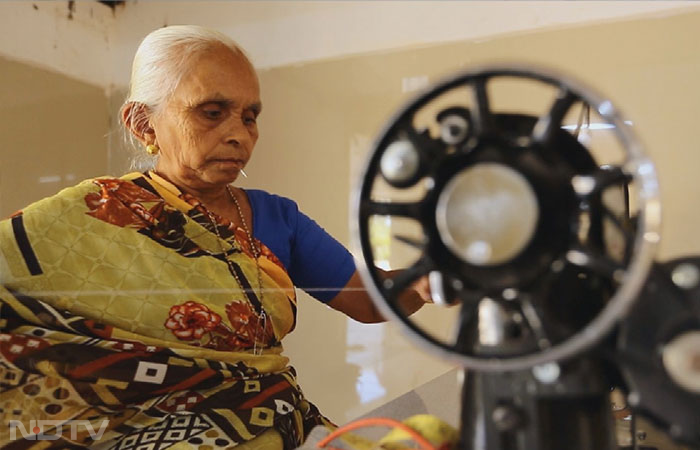 Miles away from Jamuria, USHA International conducted a 15-day Silai Training Programme, in Radhanpur, Gujarat. The  Bhansali Trust Foundation and USHA have joined hands for the upliftment of the women undertaking the training. One of the many women working for the Bhansali Trust is Darji Hansaben Pravinbhai. The 62-year-old has proven that there is no age limit to learning, as she has learned all aspects of garment construction and takes pride in it.