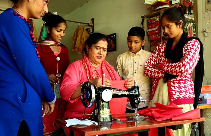 In Himachal Pradesh, Silai Hero Sandna Devi is amongst the top five highest average monthly income earning women of USHA Silai School initiative across the country. On an average she earns Rs. 16,000 to Rs. 31,000 per month.