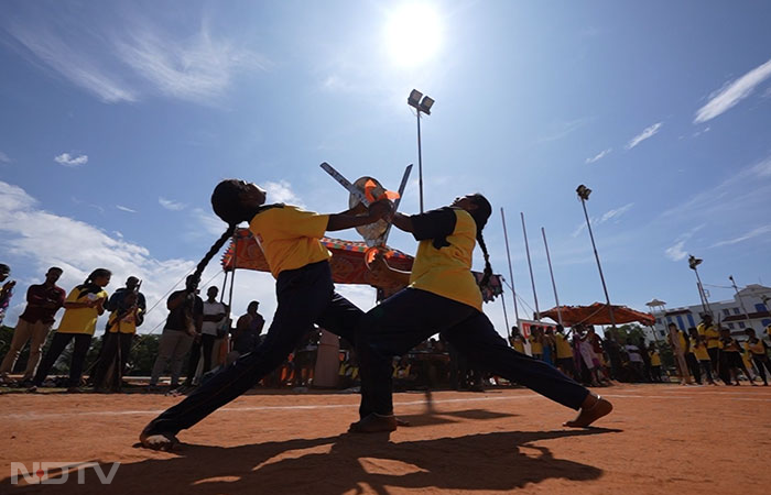 In Tamil, the word "Adimurai" combines the words "adi" meaning "to hit or strike" and "murai" meaning "method or procedure." Mentioned in 400 BCE Tamil Sangam literature, Adimurai, practiced with armed Tamil martial arts nowadays, targets important Varma points, or pressure points, in the body and focuses mostly on self-defence.