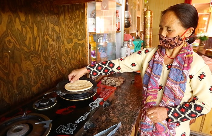 Phunchuk Dolma is another beneficiary of USHA's training programme in Ladakh. She used to earn Rs. 7,000 per month on an average by the weaving of wool and pashmina. But after getting trained in stitching at USHA Silai School, Ms Dolma is expecting to earn more as she is now able to produce finished products herself and does not require another tailor to that job for her. Even after being a senior citizen, her enthusiasm towards sewing has given her a chance to become a trainer at USHA Silai school at this age.