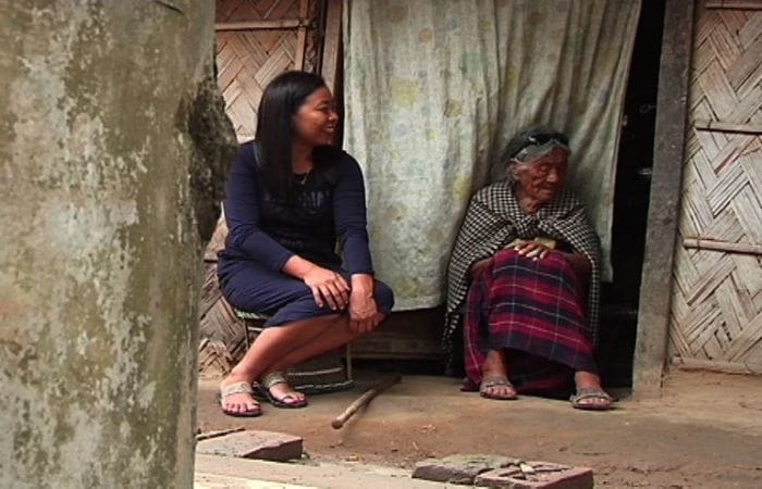 Melavino with her grandmother at their home in Dimapur where there are more than 25 Silai schools and sales centers that have been set up to help women become self-reliant.