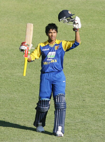 Sri Lankan batsman Dinesh Chandimal celebrates after reaching a century against India in the fifth ODI of the Micromax Cup Triangular Series in Harare. (AFP Photo) 5th ODI: India vs Sri Lanka