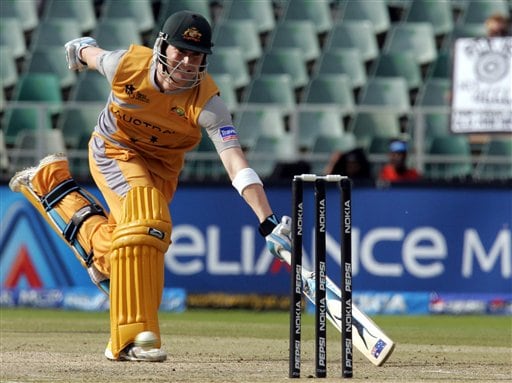 Australia's batsman Michael Clarke, runs as he unsuccessfully attempts to avoid a run out by Pakistan's fielder Shahid Afridi, not pictured, during their Super Eight match of the World Twenty20 cricket tournament against Pakistan at the Wanderers Stadium, Johannesburg, South Africa, Tuesday, Sept. 18, 2007. Australia vs Pakistan