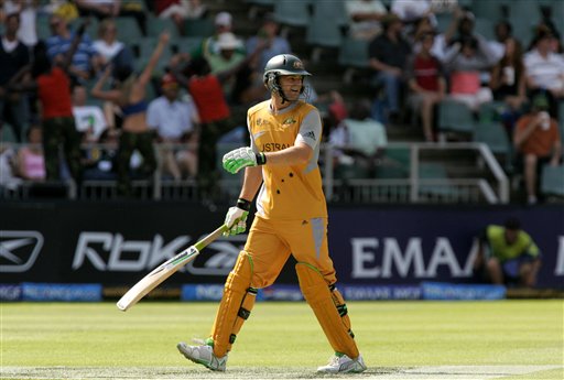 Australia's batsman Adam Gilchrist, looks back as he leaves the crease after dismissal by Pakistan's Sohail Tanvir, unseen, for 24 runs during their Super Eight's of their Twenty20 World Championship cricket match against Pakistan at the Wanderers Stadium in Johannesburg, South Africa, Tuesday, Sept. 18, 2007. Australia vs Pakistan