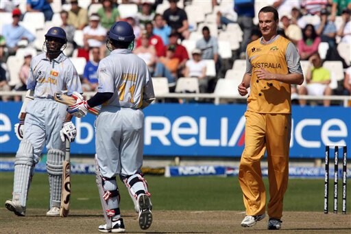 Sri Lanka's Kumar Sangakkara, leaves the field after being bowled by Australia's Stuart Clark and caught by Michael Clarke during their Twenty20 cricket match in Cape Town, South Africa, Thursday, Sept. 20, 2007. Australia vs Sri Lanka