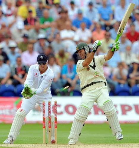 Ricky Ponting is bowled out by Monty Panesar watched by Matt Prior on the third day of the first Ashes Test in Cardiff. (AFP Photo) Ashes: 1st Test, Day 3