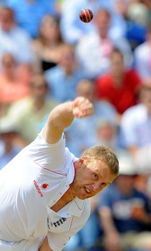 Andrew Flintoff bowls against Australia during the third day of the first Ashes Test in Cardiff. (AFP Photo) Ashes: 1st Test, Day 3