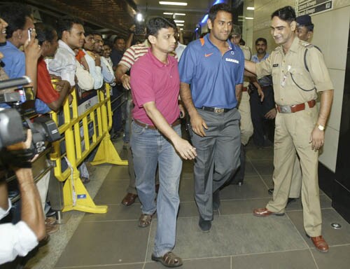India captain M.S. Dhoni arrives at the Mumbai airport. India leave for Pakistan