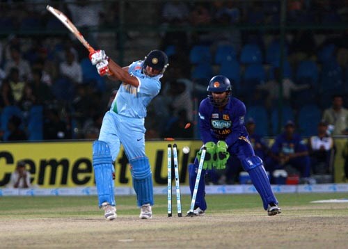 Suresh Raina is bowled by Ajanta Mendis in the Asia Cup final. Final - India vs Sri Lanka