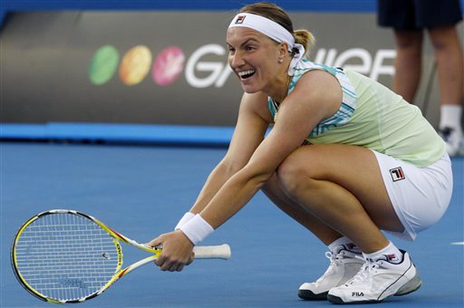 Russia's Svetlana Kuznetsova reacts as she plays Australia's Anastasia Rodionova during a women's singles match at the Australian Open on Tuesday. (AP Photo) Australian Open Day 2