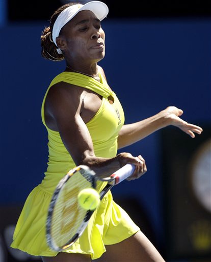Venus Williams of the United States returns to Germany's Angelique Kerber during a women's singles match at the Australian Open on Tuesday. (AP Photo) Australian Open Day 2