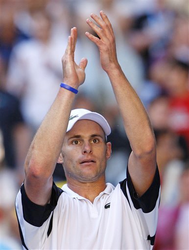 Andy Roddick of the United States celebrates after beating Spain's Tommy Robredo in their men's singles match at the Australian Open in Melbourne on Sunday. (AP Photo) Australian Open Day 7