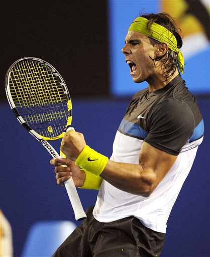 Spain's Rafael Nadal reacts as he plays France's Gilles Simon during their men's singles quarterfinal match at the Australian Open in Melbourne on Wednesday. (AP Photo) Australian Open Day 10
