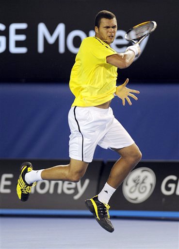 France's Jo-Wilfried Tsonga makes a return to Spain's Fernando Verdasco during their men's singles quarterfinal at the Australian Open in Melbourne on Wednesday. (AP Photo) Australian Open Day 10