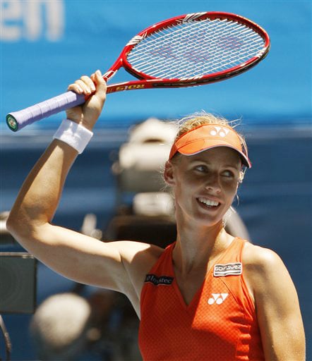 Russia's Elena Dementieva celebrates after beating Spain's Carla Suarez Navarro during their women's singles quarters at the Australian Open in Melbourne on Wednesday. (AP Photo) Australian Open Day 10
