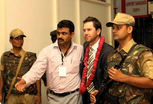 Australian captain Ricky Ponting is escorted by security officials upon arrival at the Sanganer Airport in Jaipur on September 22, 2008. (AFP Photo) Australian team arrives in India