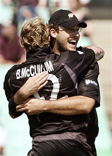 New Zealand's Daniel Vettori, right and Brendon McCullum, celebrate their team's victory over England during their Twenty20 World Championship Cricket match in Durban, South Africa, Tuesday, Sept. 18, 2007. England vs New Zealand