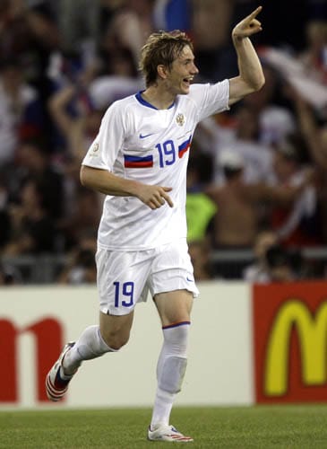 Russia's Roman Pavlyuchenko celebrates after scoring the opening goal during the quarterfinal match between the Netherlands and Russia in Basel, Switzerland. Netherlands vs Russia