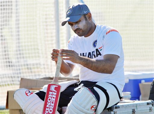 Virender Sehwag inspects his bat in nets after Team India's training at Nelson Park in Napier on Wednesday.(AP Photo) Team India at nets in Napier