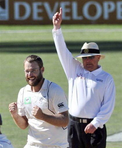Daniel Vettori celebrates as umpire Ian Gould signals the dismissal of India's Rahul Dravid for 62 during the 4th day of the 2nd Test at McLean Park in Napier on Sunday. (AP Photo) India vs NZ: 2nd Test, Day 4