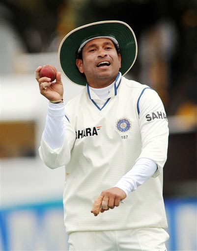India's Sachin Tendulkar spoofs his bowling style against New Zealand on the 5th day of the 3rd Test at Basin Reserve in Wellington on Tuesday. (AP Photo) India vs NZ: 3rd Test, Day 5