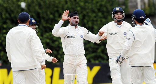 India's Harbhajan Singh celebrates the wicket of New Zealand's Tim Southee on the 5th day of the 3rd Test at Basin Reserve in Wellington on Tuesday. (AP Photo) India vs NZ: 3rd Test, Day 5