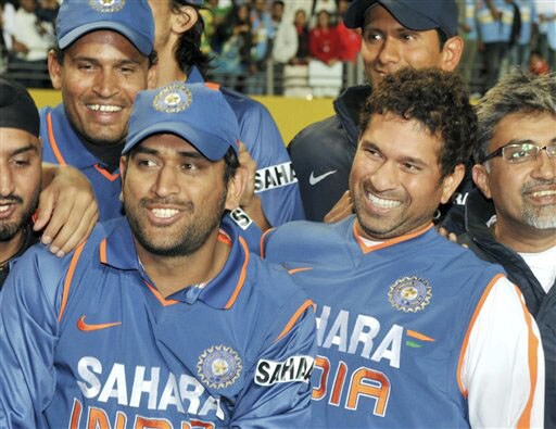 India captain MS Dhoni and Sachin Tendulkar celebrate their team's 3-1 ODI series win over New Zealand at Auckland on Saturday. (AP Photo) India win ODI series 3-1