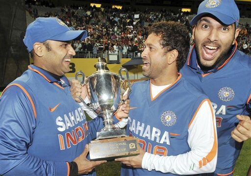 Virender Sehwag, Sachin Tendulkar and Yuvraj Singh celebrate their team's 3-1 series win over New Zealand in the ODI match at Auckland on Saturday. (AP Photo) India win ODI series 3-1