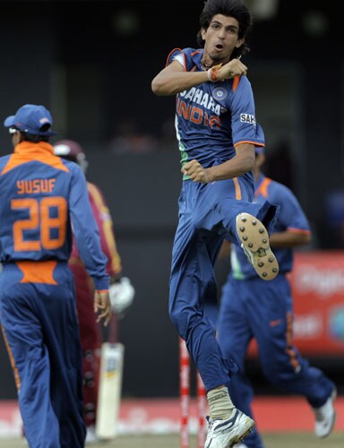 Ishant Sharma jumps into the air in celebration after taking the wicket of West Indies' Chris Gayle, who was caught behind for a duck with the second ball of the fourth and final One-Day International match at Beausejour in St. Lucia. (AP Photo) India win ODI series in WI