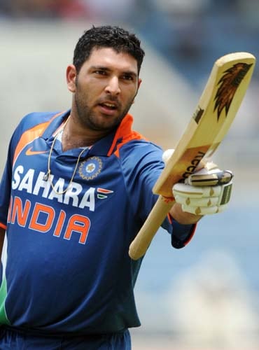 Yuvraj Singh celebrates after scoring a century during the first ODI against the West Indies at the Sabina Park. (AFP Photo) 1st ODI: IND vs WI