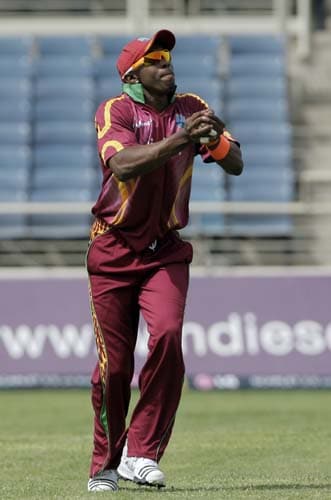 Dwayne Bravo takes the catch to dismiss opener Gautam Gambhir during their first ODI against India at Sabina Park. (AP Photo) 1st ODI: IND vs WI