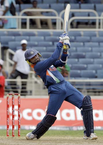 Harbhajan Singh plays a shot during the first ODI against the West Indies at Sabina Park. (AP Photo) 1st ODI: IND vs WI