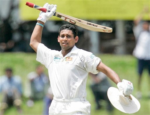 Tillakaratne Dilshan celebrates after scoring a century during the third day's play of the first Test cricket match against India in Colombo on Friday, July 25, 2008. India vs SL, 1st Test, Day 3
