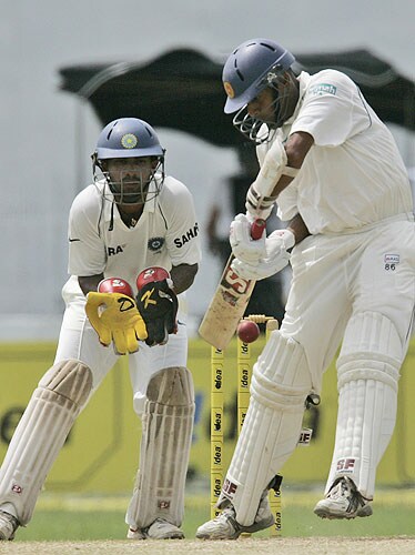 Thilan Samaraweera bats as Dinesh Karthik looks on during the second day of the first Test match in Colombo, Sri Lanka on July 24, 2008. India vs SL, 1st Test, Day 2