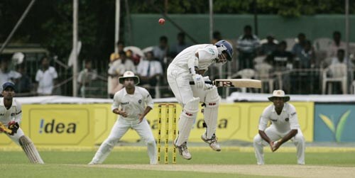 Malinda Warnapura ducks a bouncer against India on Day 1 of the first Test at the SSC Stadium on Wednesday. India vs SL, 1st Test, Day 1