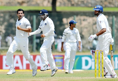 Zaheer Khan celebrates with teammate Gautam Gambhir after the dismissal of Michael Vandort during the second day of the second Test match between India and Sri Lanka in Galle on August 1, 2008. (AFP Photo) 2nd Test, Day 2: India vs SL
