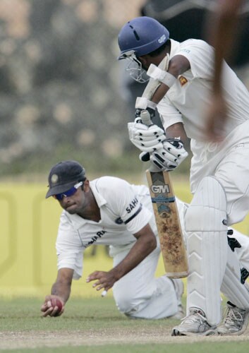 Rahul Dravid takes a catch as Prasanna Jayawardene looks on during third day of the second Test between India and Sri Lanka in Galle on August 2, 2008. 2nd Test, Day 3: India vs SL