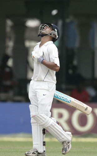 Gautam Gambhir looks skyward after scoring a half century during the first day of the third Test between India and Sri Lanka in Colombo on August 8. 3rd Test, Day 1: India vs SL
