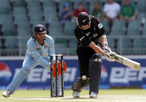 New Zealand's batsman Peter Fulton, misplays a delivery as India's wicketkeeper Mahendra Singh Dhoni, left, looks on during their Super Eight's Twenty20 World Championship cricket match against India at the Wanderers Stadium in Johannesburg, South Africa, Sunday, Sept. 16, 2007. India vs New Zealand