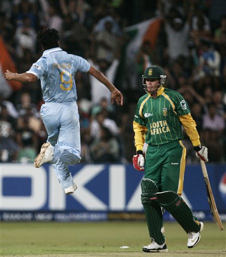 India's RP Singh, left, celebrates the dismissal of South Africa's Shaun Pollock, during their Twenty20 World Championship Cricket match in Durban, South Africa, Thursday, Sept. 20, 2007. India vs South Africa