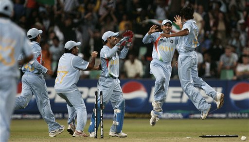 India's cricket players celebrate the dismissal of South Africa's Shaun Pollock during their Twenty20 World Championship Cricket match in Durban, South Africa, Thursday, Sept. 20, 2007. India vs South Africa