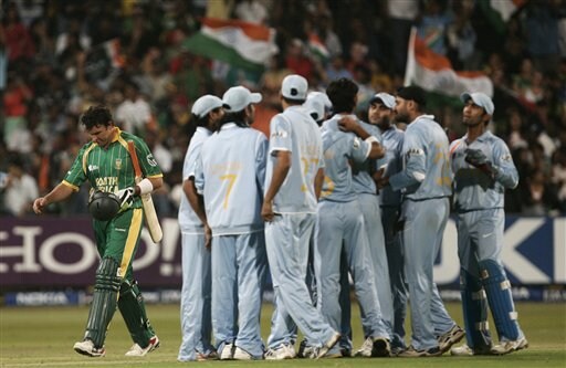 South Africa's Justin Kemp, extreme left, leaves the ground as Indian players celebrate during India and South Africa's Twenty20 World Championship Cricket match in Durban, South Africa, Thursday, Sept. 20, 2007 India vs South Africa
