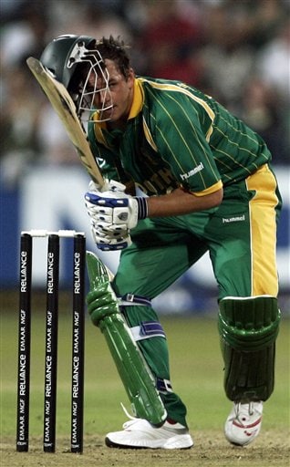 South Africa's Albie Morkel's helmet falls off as he plays a shot on the ground while batting against India during their Twenty20 World Championship Cricket match in Durban, South Africa, Thursday, Sept. 20, 2007. India vs South Africa