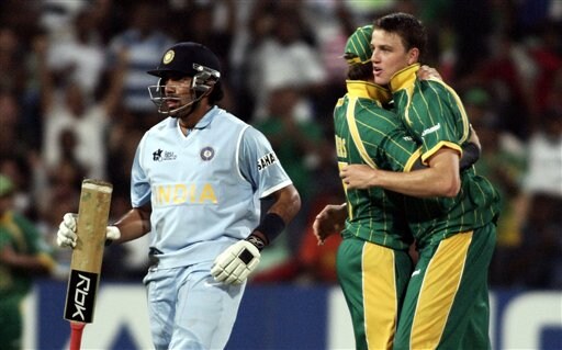South Africa's Morne Morkel, right, celebrates the dismissal of India's Robin Uthapa, left during their Twenty20 World Championship Cricket match in Durban, South Africa, Thursday, Sept. 20, 2007. India vs South Africa