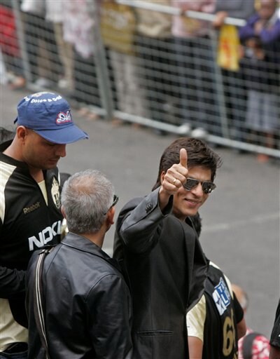 Indian movie star and owner of the Knight Riders Shah Rukh Khan gives a thumbs up during a parade through the streets of Cape Town, ahead of the Indian Premier League Twenty20 matches to be held over the weekend in Cape Town. (AP Photo) IPL-II caravan rolls out in SA