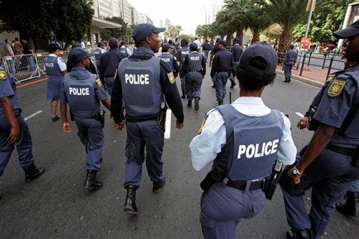 South African Police provide security at a parade for cricket fans ahead of the Indian Premier League Twenty20 cricket matches to be held over the weekend in Cape Town. (AP Photo) IPL-II caravan rolls out in SA