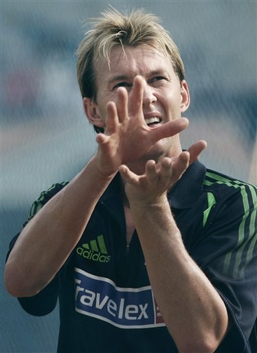 Australia's Brett Lee prepares to take a catch during a practice session, a day before the first one day international cricket match against India in Bangalore, India Friday, Sept. 28, 2007. India set for Aussies