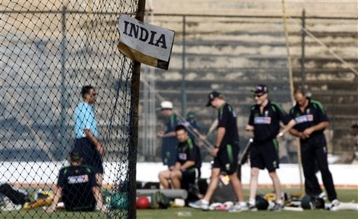 Australian cricket players practice next to the Indian practicing nets, a day before the first one day international cricket match between India and Australia in Bangalore, India Friday, Sept. 28, 2007. India set for Aussies
